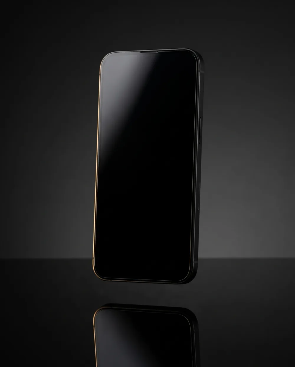 Smartphone com a tela apagada flutuando sobre uma placa de obsidiana